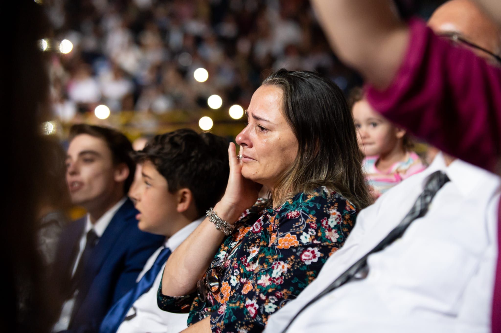A woman wipes away tears as she listens to The Tabernacle Choir at Temple Square perform at the Ginásio do Ibirapuera in São Paulo, Brazil, on March 1, 2026.