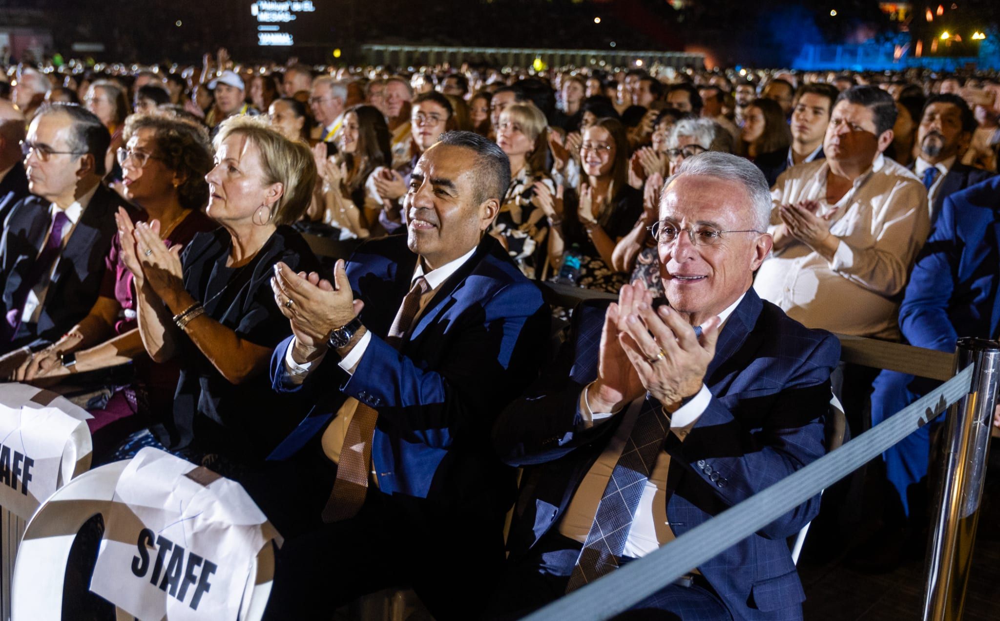 Elder Ulisses Soares, right, of the Quorum of the Twelve Apostles and Elder Jorge T. Becerra, left, a General Authority Seventy, applaud during the Choir’s “Songs of Hope” concert at the National Stadium in Lima, Peru, on Saturday, February 22, 2025.